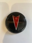 Nos Oem Gm 20462574 Pontiac Trunk Lock Cover / Decklid Emblem Black Red. Fixed Price $79.99.