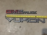 92-99 Gmc Truck Yukon Rear Tailgate Barn Door Emblem Safari Suburban. Fixed Price $50.00.