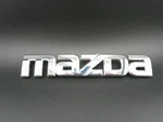 Mazda Oem Chrome Emblem Badge TD11 51 710 Genuine Rear Trunk Script 90S Japan. Fixed Price $29.99.