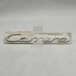 Genuine 1996 Porsche 911 Carrera Script Logo Emblem Badge 993559237024PU. Fixed Price $114.98.