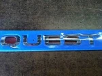 Genuine Nissan 2011-2017 Quest Nameplate 90895-1JA0A. Fixed Price $35.50.