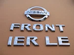05-12 Nissan Frontier Rear Tail Gate Lid Emblem Logo Badge Sign Used A47407. Fixed Price $60.00.