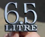 1973 1974 1975 Pontiac Grand 6.5 Litre Trunk Emblem Name Plate Oem 9658313. Fixed Price $59.99.