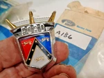 1955 Ford Rear Seat Back Emblem W/chrome Retainer B6A7925666C BM7325662B Nos. Fixed Price $115.00.