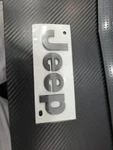 "jeep" Hood Emblem, Dark, Fits 2017-2026 Compass, 68252645AA. Fixed Price $90.00.