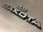 1987-1996 Dodge Dakota Fender Emblem Badge Symbol Logo Oem 3.9L. Fixed Price $29.95.