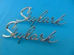 Pair 1975-1979 Buick Skylark Quarter Panel Monogram Emblem Nos Chrome. Fixed Price $69.00.