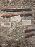 Genuine Toyota 2024 + Tacoma SR5 Matte Black Emblem Overlay Set PT948-35244-02. Fixed Price $75.00.