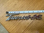 1998-1999 Ford Taurus Se Emblem Badge Rear Bumper Oem F8DB-16702. Fixed Price $14.24.