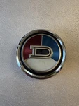 Datsun 1200 Front Grille Emblem New, Oem. Fixed Price $280.00.
