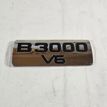 1998-2010 Mazda "B3000 V6" Plastic Chrome Fender Emblem Used F67B-16B114-EA. Fixed Price $11.99.