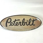 Peterbilt Emblem Factory Plate 20-16498 Chrome 20-16527 Gold Oval With Pins. Fixed Price $48.38.