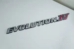 Genuine Mitsubishi Evolution 4 Rear Badge Emblem MR300579 Rare Discontinued. Fixed Price $180.00.