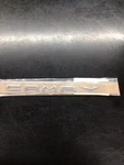 Genuine Toyota Emblem Vehicle Name 75442-AQ010. Fixed Price $35.00.