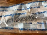 1982-1991 Cadillac Seville Rear Trunk Lid Script Emblem PN#20288891NEW Old Stock. Fixed Price $50.00.