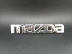 Mazda Oem Rear Trunk Chrome Emblem Badge Genuine BN8V-51-710 Fits Multiple Model. Fixed Price $21.99.
