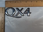 Infiniti Oem 1997-2003 QX4 Rear Tailgate Emblem Badge Logo #90894 1W311 Used. Fixed Price $6.21.