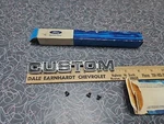 1970'S Ford Econoline Van "custom" Emblem Metal Oem Nos Original With Fasteners. Fixed Price $40.00.