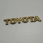 Toyota Gold Emblem Badge 75447-AC020 Genuine Oem Rear Trunk Nameplate Logo Japan. Fixed Price $19.99.