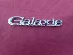 1973-74 Ford Galaxie Trunk Emblem, Nos! Script D3AB-6542528-AA Decklid. Fixed Price $44.99.