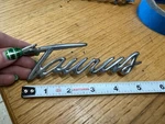 1998-1999 Ford Taurus Emblem Badge Rear Bumper Oem. Fixed Price $14.24.