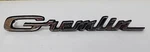 Oem Roof Quarter Panel Script Emblem W/ Pins 3632056 1970-73 Amc Gremlin (587. Fixed Price $49.95.