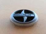 04 05 06 Scion Xb Front Grille Emblem Logo Badge Sign Symbol Used White A47991. Fixed Price $60.00.