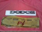 1979-85 Dodge Ram Truck, Charger N.o.s Chrome Hood Script # 4081384. Fixed Price $79.50.