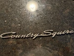 Ford Country Squire Emblem. Fixed Price $35.00.