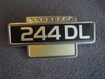 Volvo New Nos Original 244 Dl Badge Part # 1202420. Fixed Price $35.00.