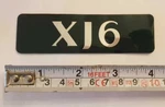 Jaguar XJ6 X300 Rear Trunk Boot Badge Emblem Genuine New HNA5994NA (insert). Fixed Price $28.90.