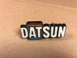 1972 1973 1974 1975 1976 1977 Datsun Bluebird Grille Emblem 62810-U2001. Fixed Price $80.00.