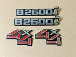 1989/93 Mazda B2600I Fender Emblem Oem 4PC Logo Badge Set W/ 4X4. Fixed Price $55.00.