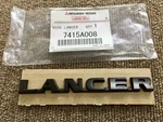 Genuine Mitsubishi Lancer Evolution & 9 Rear Boot Badge Emblem 7415A008. Fixed Price $51.03.