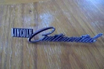 1975-1979 Lincoln Continental Headlight Door Script Emblem D5VB-13B124-AA. Fixed Price $29.00.