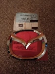 Genuine Mazda Emblem GS2A-51-731. Fixed Price $20.00.