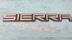 15603693GM Plate Assembly, End Gate Name "SIERRA"1988-2000. Fixed Price $24.99.