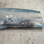 New Oem Gm 20278557 Nameplate Emblem 1982-87 Grand Prix Door Nos. Fixed Price $58.80.