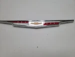 1960'S Era Chevrolet Front Emblem Bezel Chrome PT3816347 Oem Used Auto Part. Fixed Price $75.06.