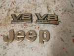 1993-1998 Jeep Grand Cherokee Zj Gold V8 Emblem Rear Liftgate Header Panel. Fixed Price $38.99.