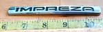 Subaru Impreza Circa '05 Emblem 93073 FE120 02 (1573). Fixed Price $5.00.
