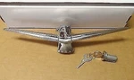 New 1960 Ford Thunderbird Hardtop Trunk Lock Cover Emblem Ornament W/. Fixed Price $267.00.
