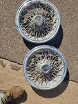 Pontiac Hubcaps 254842. Fixed Price $50.00.