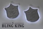 Two Tiarra Grille Light Up Badges Chrome Led Emblems Halo Shield. Fixed Price $185.00.