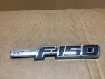 2009-2014 Ford "F-150 Xlt" Plastic Left Fender Emblem P/n BL34-16B115-AA. Fixed Price $17.99.