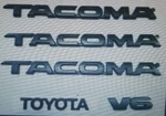 Toyota Tacoma Emblems 5 Pcs Set/ Doors And Tailgate Black Abs Decals New. Fixed Price $22.99.