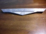 1961 Chevy Corvair Lakewood Wagon - Rear Tailgate Emblem. Fixed Price $59.00.
