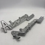 Pair Of Dodge 1974-1979 Truck Adventurer Sport Fender Emblems 3494086 3496699. Fixed Price $59.66.
