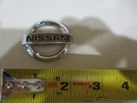 Nissan Star Symbol Emblem Oem Trunk Chrome. Fixed Price $19.99.