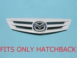 04 05 06 Hatchback Upper Top Front Bumper Grille Emblem Used #6. Fixed Price $150.00.